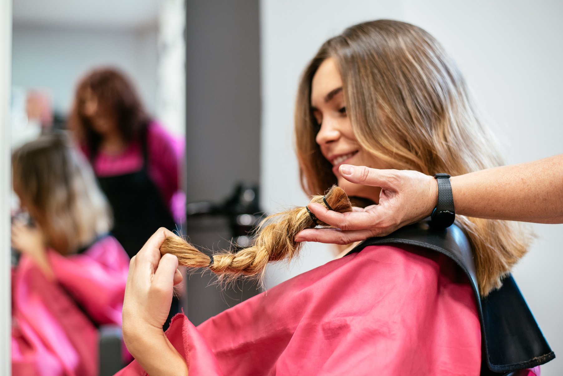 Woman donating hair for cancer